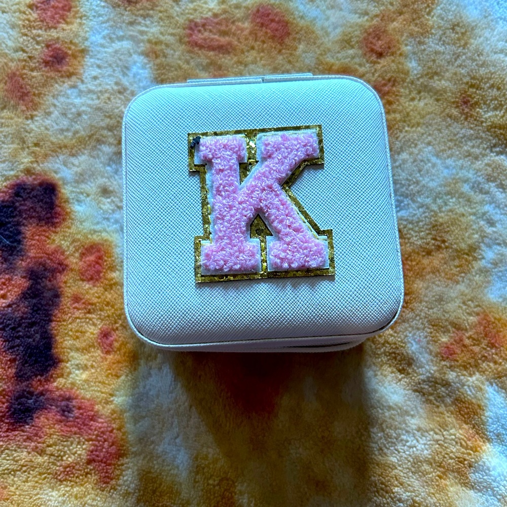 Small square white travel  Monogramed jewelry box with a Pink K on the front
